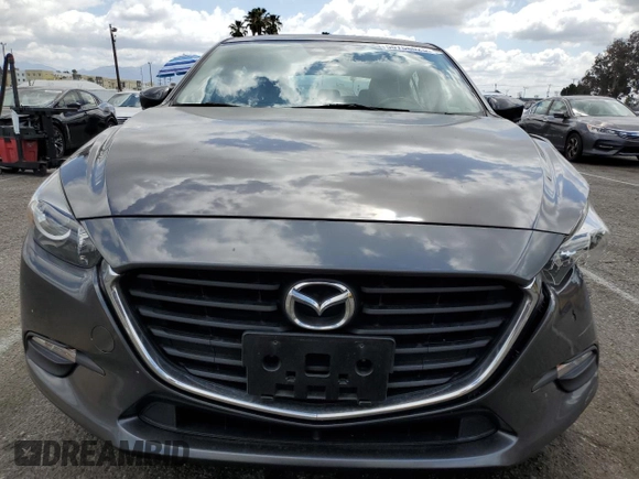 2018 Mazda 3 Touring z VIN 3MZBN1L38JM219466, wystawiony jako Copart lot #56766025 z przebiegiem 124 775 mil mil oraz Szkoda całkowita • Salvage title. Historia ofert i sprzedaży dostępna na DreamBid. Obrazek 5.