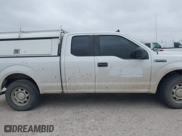 2020 Ford F-150 XL z VIN 1FTEX1C52LFA73368, wystawiony jako IAAI lot #41674867 z przebiegiem 170 542 mil mil oraz . Historia ofert i sprzedaży dostępna na DreamBid. Obrazek 13.