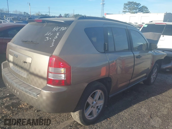 2007 Jeep Compass Sport with VIN 1J8FT47W57D158543, listed as a IAAI auction lot 41817636 with 241,439 mi miles. Bid and sale history available at carsss.com. Image 4.