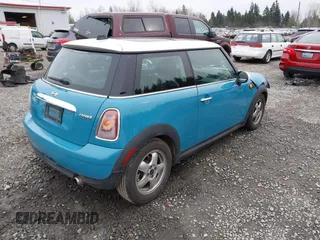 2009 MINI Cooper Hardtop with VIN WMWMF33569TW70413, listed as a IAAI auction lot 41776589 with 85,394 mi miles. Bid and sale history available at carsss.com. Image 4.