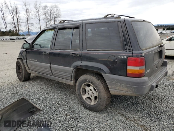 1996 Jeep Grand Cherokee Laredo with VIN 1J4GZ58S2TC174270, listed as a Copart auction lot 49924815 with 0 mi miles and Salvage Title. Bid and sale history available at carsss.com. Image 2.