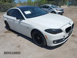2014 BMW 5 Series 528i xDrive z VIN WBA5A7C53ED615352, wystawiony jako IAAI lot #42235339 z przebiegiem 152 680 mil mil oraz . Historia ofert i sprzedaży dostępna na DreamBid. Obrazek 1.