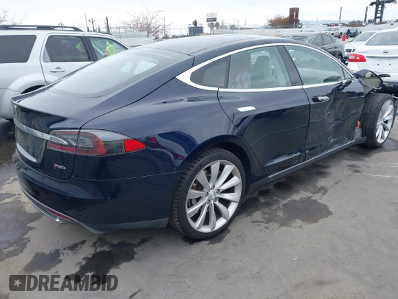 2014 Tesla Model S 60 with VIN 5YJSA1H10EFP30234, listed as a IAAI auction lot 42182249 with 186,654 mi miles and . Bid and sale history available at DreamBid. Image 4.