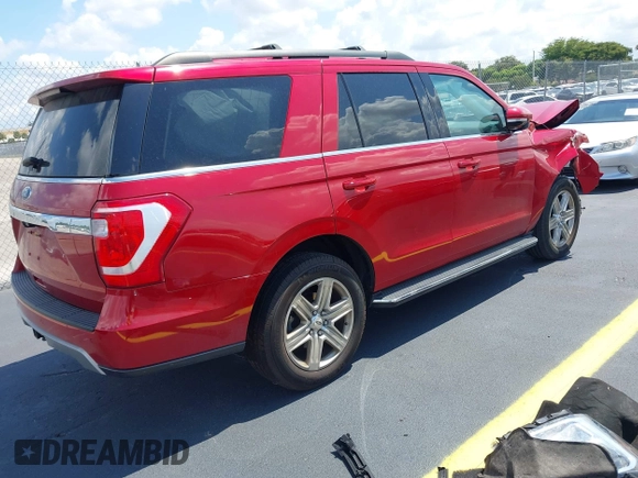 2020 Ford Expedition XLT with VIN 1FMJU1HTXLEA74798, listed as a IAAI auction lot 42181221 with 72,419 mi miles and . Bid and sale history available at DreamBid. Image 4.