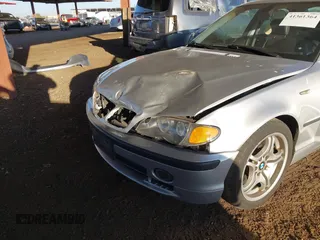 2005 BMW 3 Series 330i with VIN WBAEV53475KM43130, listed as a IAAI auction lot 41361364 with 152,382 mi miles. Bid and sale history available at carsss.com. Image 6.