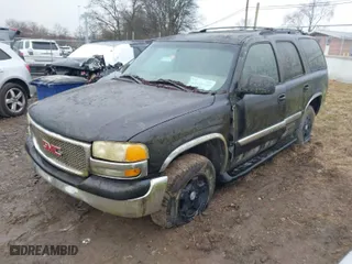 2003 GMC Yukon SLT with VIN 1GKEK13Z73J168530, listed as a IAAI auction lot 41437155 with 1 mi miles. Bid and sale history available at carsss.com. Image 2.