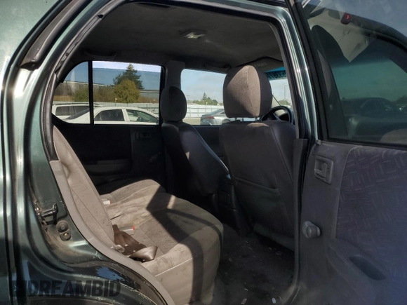 2004 Isuzu Rodeo S with VIN 4S2CK58W344303242, listed as a Copart auction lot 75339714 with 106,659 mi miles and Salvage title. Bid and sale history available at DreamBid. Image 12.