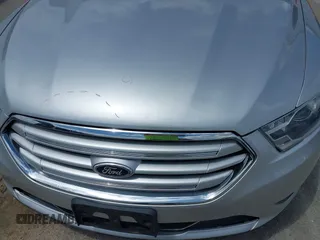 2013 Ford Taurus Limited with VIN 1FAHP2F8XDG117448, listed as a IAAI auction lot 39585596 with 150,747 mi miles and . Bid and sale history available at DreamBid. Image 13.