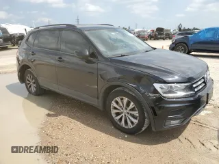 2018 Volkswagen Tiguan S with VIN 3VV1B7AX9JM020833, listed as a Copart auction lot 54539565 with 69,904 mi miles and Salvage title. Bid and sale history available at DreamBid. Image 4.