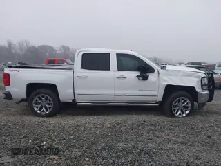 2016 Chevrolet Silverado 1500 LTZ with VIN 3GCUKSEC5GG343533, listed as a IAAI auction lot 41202553 with 207,973 mi miles and . Bid and sale history available at DreamBid. Image 13.