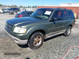 2002 Ford Explorer Sport Value with VIN 1FMYU60E32UD12858, listed as a IAAI auction lot 41810679 with 179,900 mi miles and . Bid and sale history available at DreamBid. Image 2.