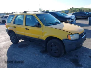 2002 Ford Escape XLS Choice with VIN 1FMYU01132KD56671, listed as a IAAI auction lot 41552541 with 245,923 mi miles and . Bid and sale history available at DreamBid. Image 1.
