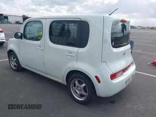 2010 Nissan Cube S z VIN JN8AZ2KRXAT161347, wystawiony jako IAAI lot #41921669 z przebiegiem 161 121 mil mil oraz . Historia ofert i sprzedaży dostępna na DreamBid. Obrazek 3.
