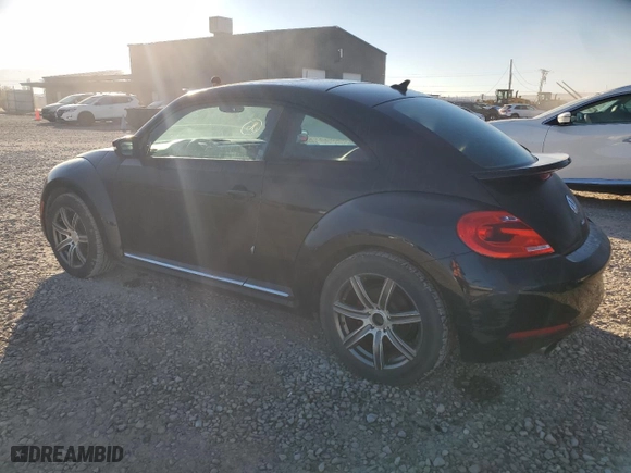 2012 Volkswagen Beetle 2.0T Turbo w/Sun/Sound PZEV with VIN 3VWVA7AT5CM628848, listed as a Copart auction lot 76992504 with 0 mi miles and Salvage Title. Bid and sale history available at carsss.com. Image 1.