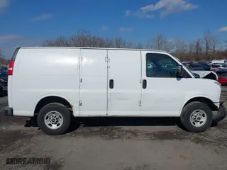 2009 GMC Savana Cargo Van with VIN 1GTGG25C591106833, listed as a IAAI auction lot 41381092 with 380,569 mi miles. Bid and sale history available at carsss.com. Image 12.