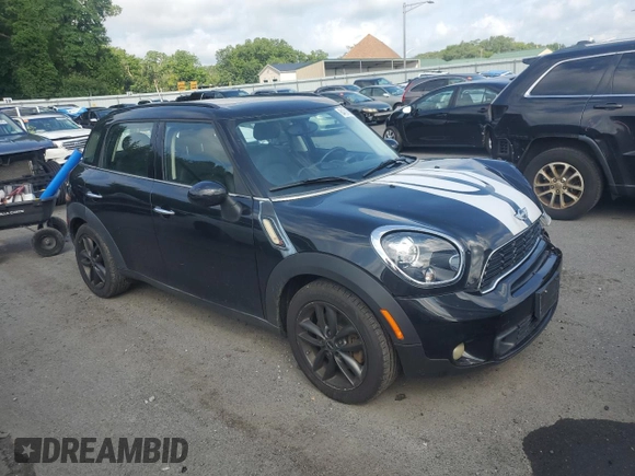 2012 MINI Countryman S with VIN WMWZC3C50CWM28043, listed as a Copart auction lot 64701505 with 166,819 mi miles and Salvage title. Bid and sale history available at DreamBid. Image 4.