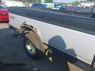 1996 Ford F-150 with VIN 1FTEX14H0TKA49456, listed as a IAAI auction lot 42689128 with 243,331 mi miles and . Bid and sale history available at DreamBid. Image 13.
