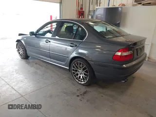 2003 BMW 3 Series 330xi with VIN WBAEW53463PG22999, listed as a IAAI auction lot 41596907 with 160,812 mi miles. Bid and sale history available at carsss.com. Image 3.