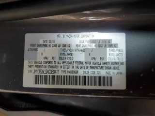2010 Mazda 5 Sport z VIN JM1CR2WL9A0380411, wystawiony jako Copart lot #59093575 z przebiegiem 177 765 mil mil oraz Szkoda całkowita • Salvage title. Historia ofert i sprzedaży dostępna na DreamBid. Obrazek 13.