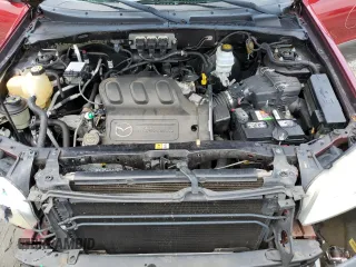 2005 Mazda Tribute S with VIN 4F2CZ04125KM19257, listed as a Copart auction lot 67370664 with 140,348 mi miles and Salvage Title. Bid and sale history available at carsss.com. Image 11.