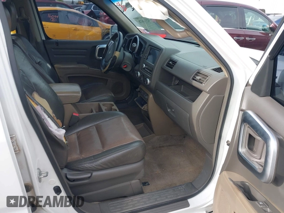 2006 Honda Ridgeline RTL z VIN 2HJYK16586H519593, wystawiony jako IAAI lot #42111678 z przebiegiem 244 962 mil mil oraz . Historia ofert i sprzedaży dostępna na DreamBid. Obrazek 5.