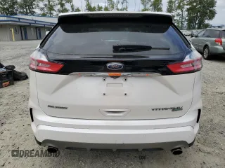 2019 Ford Edge Titanium z VIN 2FMPK3K99KBB49428, wystawiony jako Copart lot #60663125 z przebiegiem 60 383 mil mil oraz Szkoda całkowita • Salvage title. Historia ofert i sprzedaży dostępna na DreamBid. Obrazek 6.