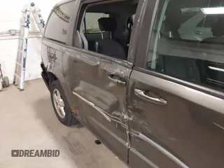 2010 Dodge Grand Caravan SXT z VIN 2D4RN5D14AR416488, wystawiony jako IAAI lot #38412602 z przebiegiem 136 997 mil mil oraz . Historia ofert i sprzedaży dostępna na DreamBid. Obrazek 6.