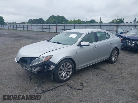 2013 Lincoln MKS с VIN 1LNHL9DK3DG604712, выставлен на аукционе IAAI как лот 42351237 с пробегом 144 927 миль миль и . История ставок и продаж доступна на DreamBid. Изображение 2.