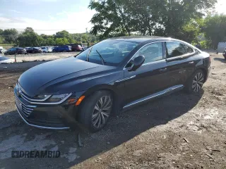 2020 Volkswagen Arteon z VIN WVWDR7AN8LE012463, wystawiony jako Copart lot #63841913 z przebiegiem 14 396 mil mil oraz . Historia ofert i sprzedaży dostępna na DreamBid. Obrazek 1.