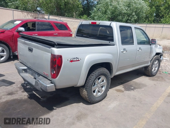 2012 GMC Canyon SLE1 with VIN 1GTH6MFE3C8127620, listed as a IAAI auction lot 42488957 with 92,593 mi miles and . Bid and sale history available at DreamBid. Image 4.