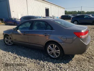 2012 Lincoln MKZ z VIN 3LNHL2JC0CR823283, wystawiony jako Copart lot #43361965 z przebiegiem 128 053 mil mil oraz Szkoda całkowita • Salvage title. Historia ofert i sprzedaży dostępna na DreamBid. Obrazek 2.