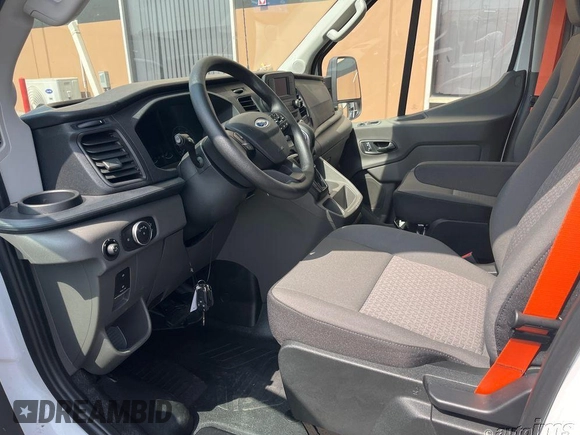 2023 Ford Transit Cargo with VIN 1FTBR1X80PKC09351, listed as a IAAI auction lot 42658958 with 115 mi miles and . Bid and sale history available at DreamBid. Image 9.