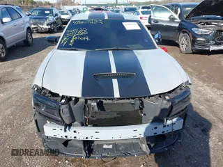 2022 Dodge Charger Scat Pack Widebody with VIN 2C3CDXGJ6NH176650, listed as a IAAI auction lot 41863122 with 34,569 mi miles and . Bid and sale history available at DreamBid. Image 12.