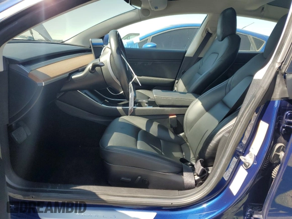 2019 Tesla Model 3 Mid Range with VIN 5YJ3E1EA8KF299456, listed as a Copart auction lot 48152695 with 27,144 mi miles and Salvage Title. Bid and sale history available at DreamBid. Image 7.