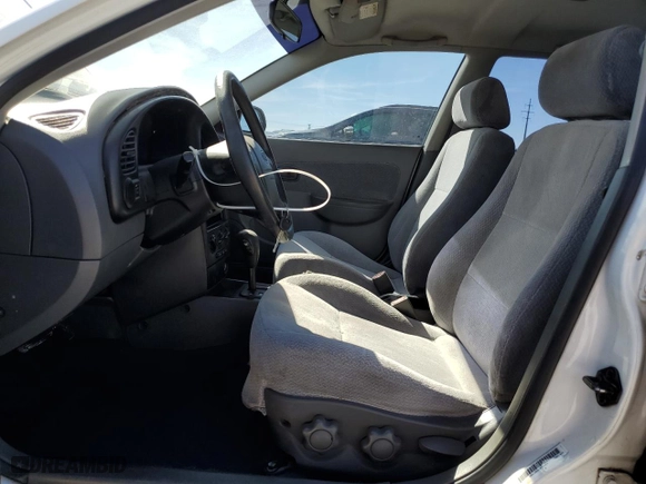 2002 Kia Spectra GS with VIN KNAFB161725077686, listed as a Copart auction lot 48618095 with 99,702 mi miles and Salvage Title. Bid and sale history available at carsss.com. Image 7.