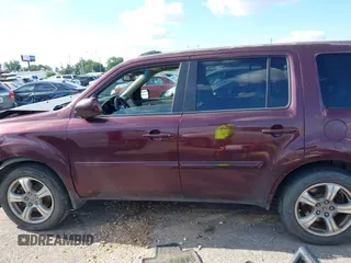2013 Honda Pilot EX-L with VIN 5FNYF3H58DB032933, listed as a IAAI auction lot 42213061 with 166,496 mi miles and . Bid and sale history available at DreamBid. Image 14.