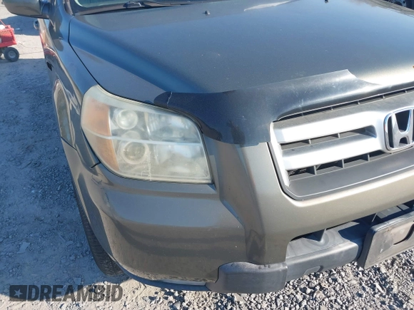 2006 Honda Pilot EX-L with VIN 5FNYF18766B026721, listed as a IAAI auction lot 41690993 with 219,473 mi miles and . Bid and sale history available at DreamBid. Image 6.