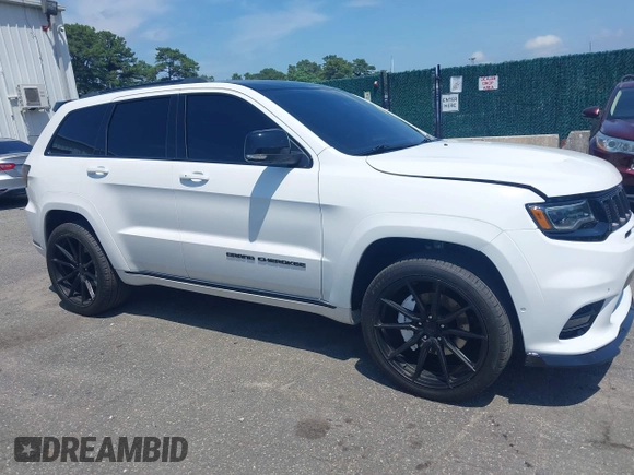 2019 Jeep Grand Cherokee Summit with VIN 1C4RJFJT1KC785744, listed as a IAAI auction lot 42645006 with 38,483 mi miles and . Bid and sale history available at DreamBid. Image 13.