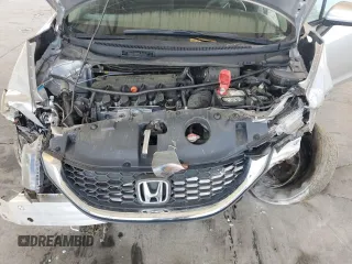 2014 Honda Civic LX z VIN 19XFB2F52EE011454, wystawiony jako Copart lot #55833675 z przebiegiem 44 577 mil mil oraz Szkoda całkowita • Salvage title. Historia ofert i sprzedaży dostępna na DreamBid. Obrazek 11.