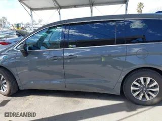 2023 Chrysler Pacifica Hybrid Touring L with VIN 2C4RC1L73PR509853, listed as a IAAI auction lot 41690872 with 83,014 mi miles. Bid and sale history available at carsss.com. Image 15.