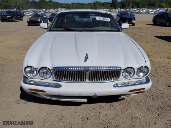 2000 Jaguar XJ with VIN SAJDA14C2YLF11720, listed as a Copart auction lot 73523584 with 119,188 mi miles and Clean Title. Bid and sale history available at carsss.com. Image 5.