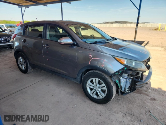 2011 Kia Sportage LX with VIN KNDPBCA22B7017760, listed as a Copart auction lot 60570025 with 118,617 mi miles and Salvage title. Bid and sale history available at DreamBid. Image 4.