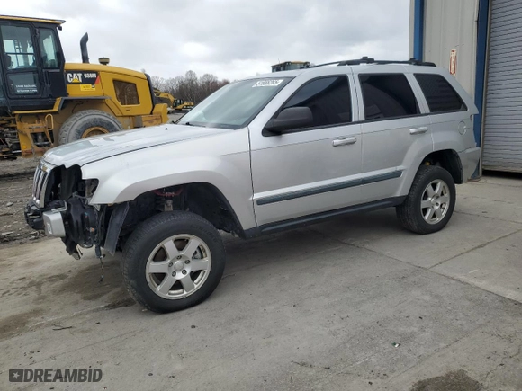 2009 Jeep Grand Cherokee Laredo with VIN 1J8GR48K89C522896, listed as a Copart auction lot 51656265 with 211,359 mi miles and Salvage Title. Bid and sale history available at carsss.com. Image 1.