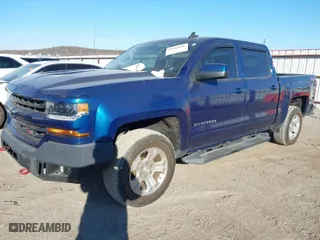 2017 Chevrolet Silverado 1500 LT with VIN 3GCUKREC9HG245776, listed as a IAAI auction lot 41160606 with 104,606 mi miles. Bid and sale history available at carsss.com. Image 2.