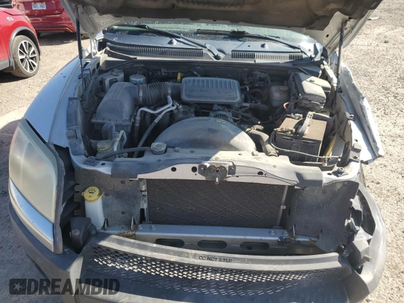2006 Mitsubishi Raider LS z VIN 1Z7HC22K06S581912, wystawiony jako Copart lot #70500254 z przebiegiem 137 038 mil mil oraz Szkoda całkowita • Salvage title. Historia ofert i sprzedaży dostępna na DreamBid. Obrazek 11.