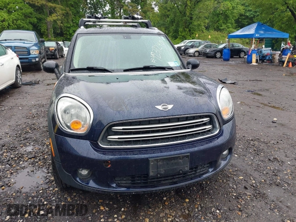 2015 MINI Countryman z VIN WMWZB3C59FWR43890, wystawiony jako IAAI lot #42372407 z przebiegiem 131 884 mil mil oraz . Historia ofert i sprzedaży dostępna na DreamBid. Obrazek 6.