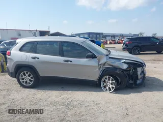 2015 Jeep Cherokee Sport with VIN 1C4PJMAB5FW533972, listed as a IAAI auction lot 41865291 with 106,063 mi miles. Bid and sale history available at carsss.com. Image 14.