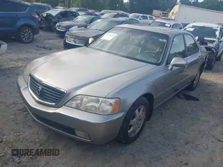 2002 Acura RL с VIN JH4KA965X2C012055, выставлен на аукционе IAAI как лот 42273551 с пробегом 148 392 миль миль и . История ставок и продаж доступна на DreamBid. Изображение 17.