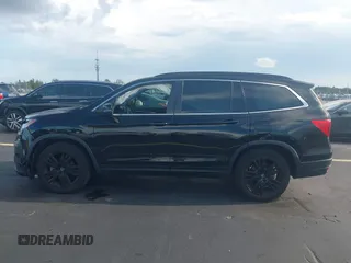 2022 Honda Pilot Special Edition with VIN 5FNYF5H25NB026414, listed as a IAAI auction lot 42590493 with 26,600 mi miles and . Bid and sale history available at DreamBid. Image 14.