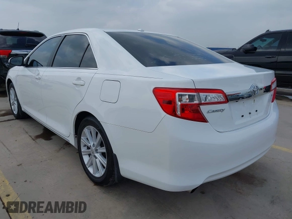 2014 Toyota Camry SE with VIN 4T1BK1FK5EU551196, listed as a IAAI auction lot 41912297 with 104,445 mi miles. Bid and sale history available at carsss.com. Image 3.